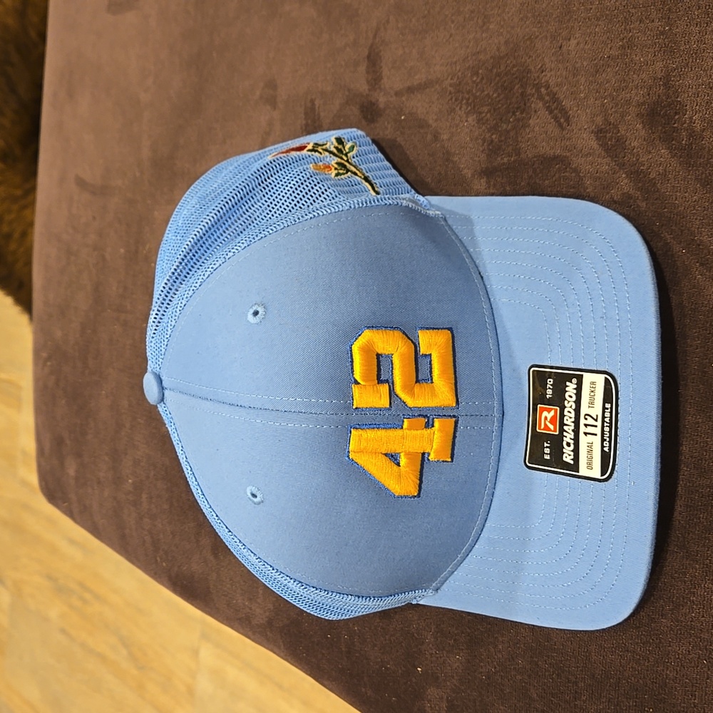 NWT Light blue Baseball Cap with embroidered🌹n gold # 42 on the front.